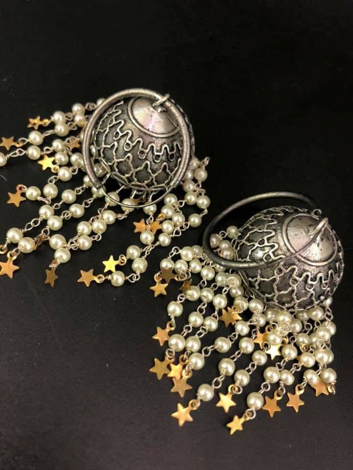 Pearl Star Jhumka Earrings: Carved Metal Drop Earrings