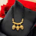 Handcrafted African Mask Necklace: Gold-Tone Ethnic Choker