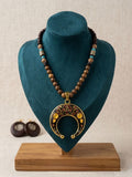 Wooden Bead Necklace with Crescent Om Pendant – Tribal Statement Jewelry